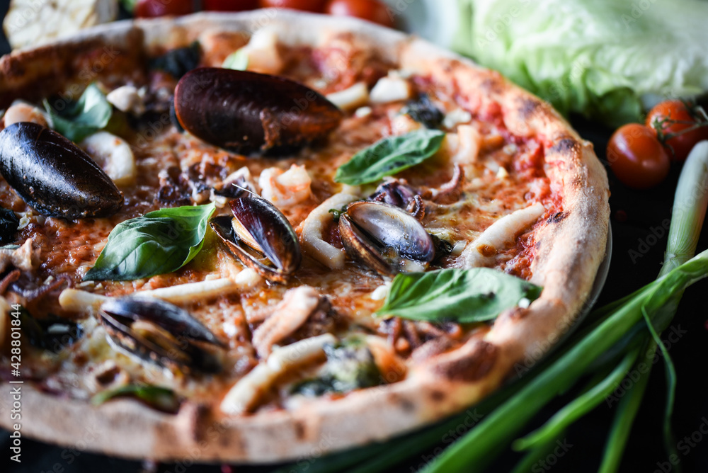 delicious italian pizza with fresh seafood delicious italian pizza with fresh seafood