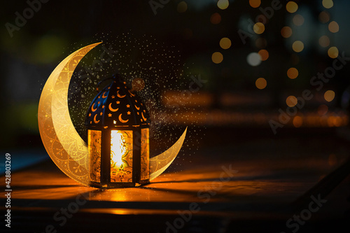 Ornamental Arabic lantern with crescent moon - Ramadan Kareem