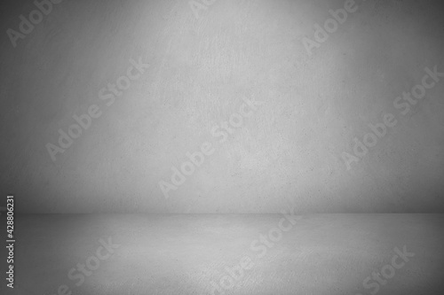 Gray vintage cement or concrete wall and floor background. Can be used for display commercial products, room, interior, graphic design or wallpaper. Copy space for text.