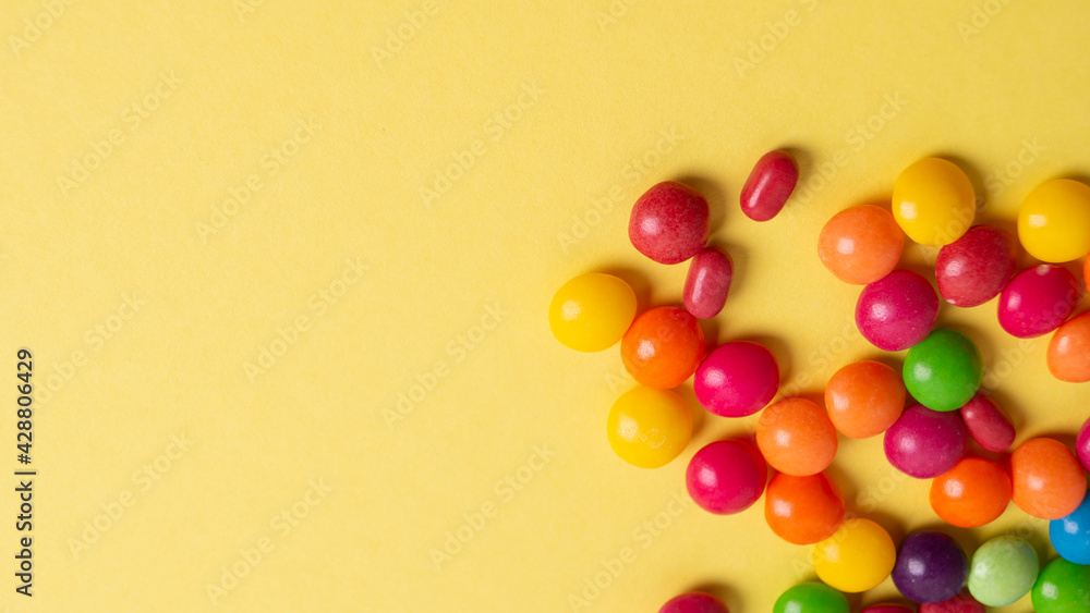 Obraz premium background, blue, board, bright, candies, candy, childhood, chocolate, closeup, coated, colorful, concept, confectionery, copy, delicious, dessert, easter, eat, food, fun, holiday, isolated, juicy, ma