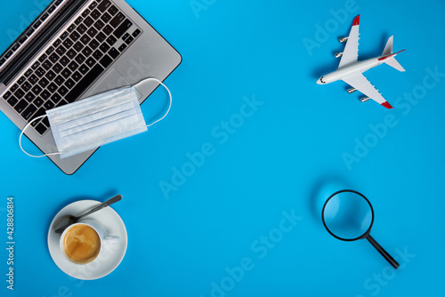 Airplane tickets search concept flat lay