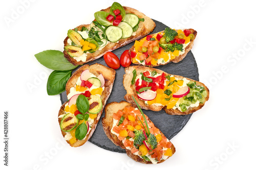 Bruschetta with mozzarella cheese, isolated on white background. High resolution image