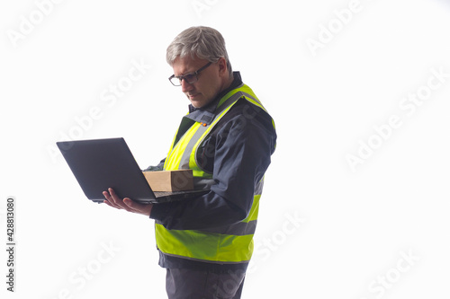 Man with laptop and a cardb...