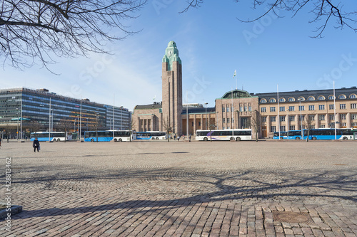Finland. Helsinki. April 15, 2021 View of the square near the railway station and city buses
