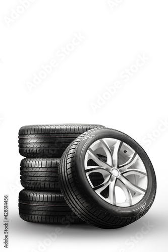 summer tires and wheels - stack on a white background, new wheels vertical photo