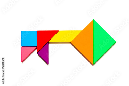 Color tangram puzzle in key shape on white background