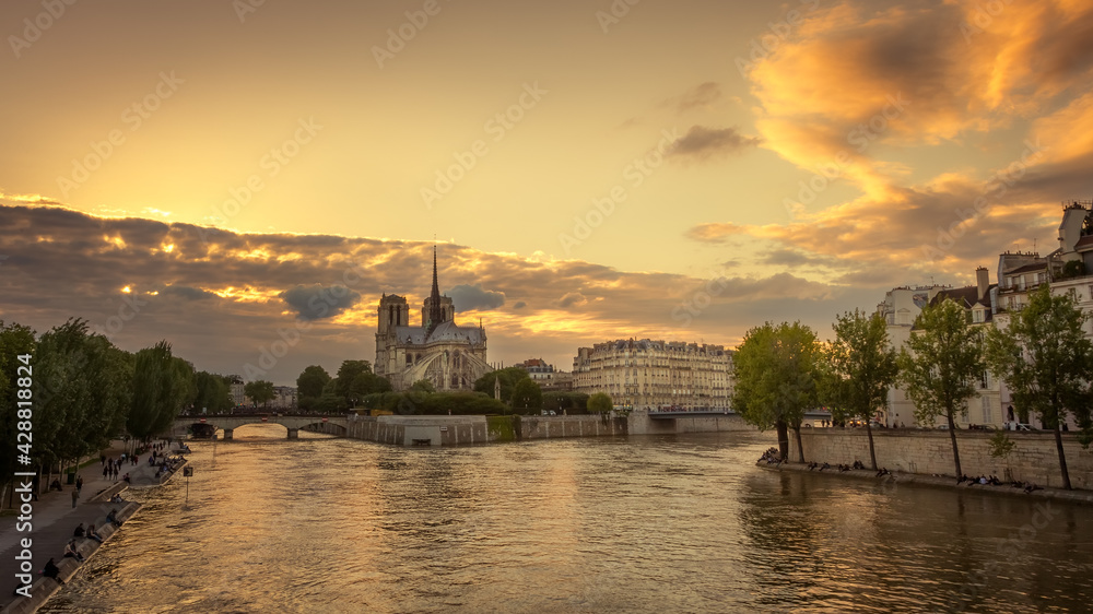 Notre Dame de Paris and the Seine River at sunset. Paris, France