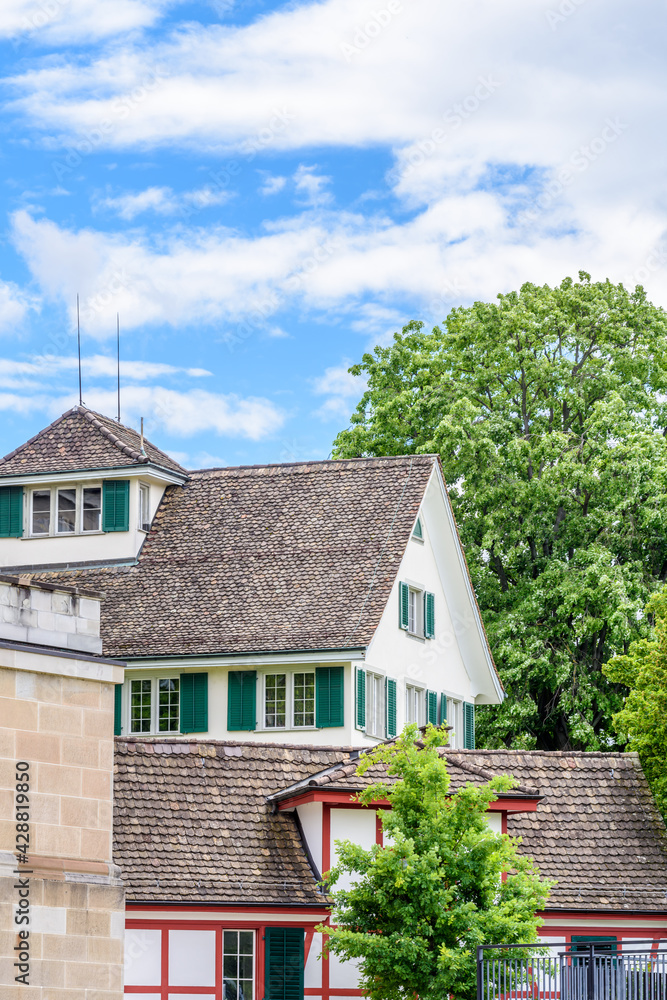View of historic Zurich city center on a cloudy day in summer, Canton of Zurich, Switzerland. View of historic Zurich city center on a cloudy day in summer, Canton of Zurich, Switzerland.