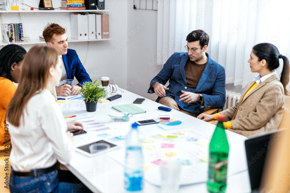 Cinematic image of employers working in a start up business Cinematic image of employers working in a start up business