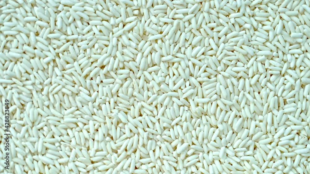 Close-up shot of long-grain rice, rotating view Close-up shot of long-grain rice, rotating view