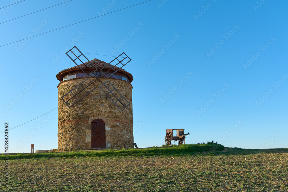 Manchego style windmill located in the town of Aguilar de Campos, Tierra de Campos, Spain. This mill is similar to those of Don Quixote but currently a rarity in the northern plateau of Spain.