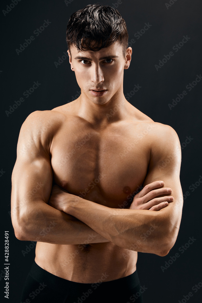 bodybuilder muscular naked body studio dark background