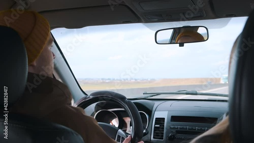 Wallpaper Mural A young couple travels by car. View from the car. High quality 4k footage Torontodigital.ca