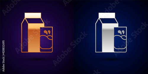Gold and silver Paper package for kefir and glass icon isolated on black background. Dieting food for healthy lifestyle and probiotics fulfillment. Vector