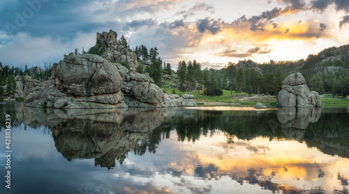 Fototapeta Naklejka Na Ścianę i Meble -  Sunrise reflection from Sylvan Lake in Custer State Park - South Dakota Black Hills