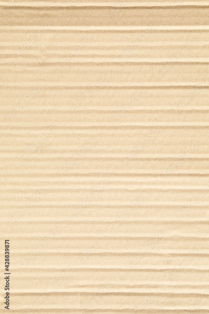 Vertical kraft brown carton paper background texture Vertical kraft brown carton paper background texture
