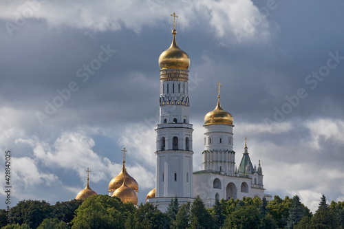 The Ivan the Great Bell-Tower and the onion domes of the Dormition Cathedral in Moscow, Russia