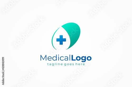 Medical Logo Healthcare Symbol. Blue and Green Capsule with Cross Sign and Negative Space Waterdrop Combination isolated on White Background. Flat Vector Logo Design Template Element.