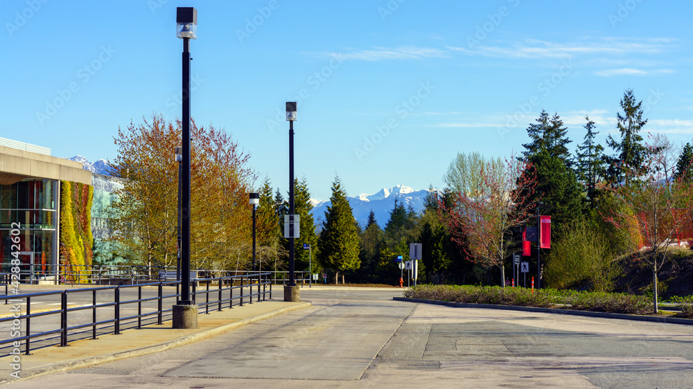 Alpine North Shore mountains, viewed from transit hub at UniverCity Highlands on a crisp spring morning.