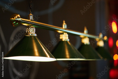 Lamps are green. Lamps are dark green.