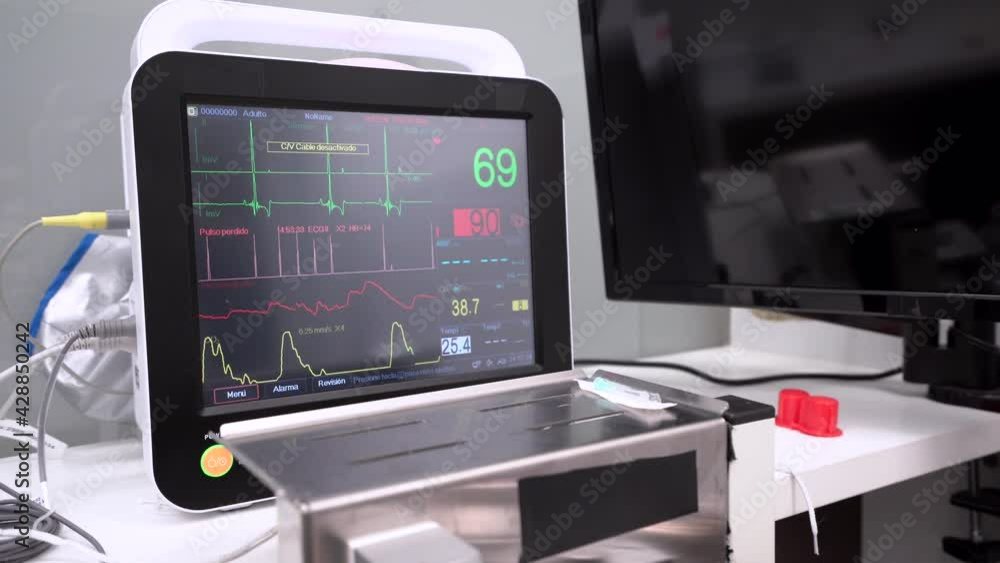 Heart rate monitor with graphics and numbers in hospital Heart rate monitor with graphics and numbers in hospital
