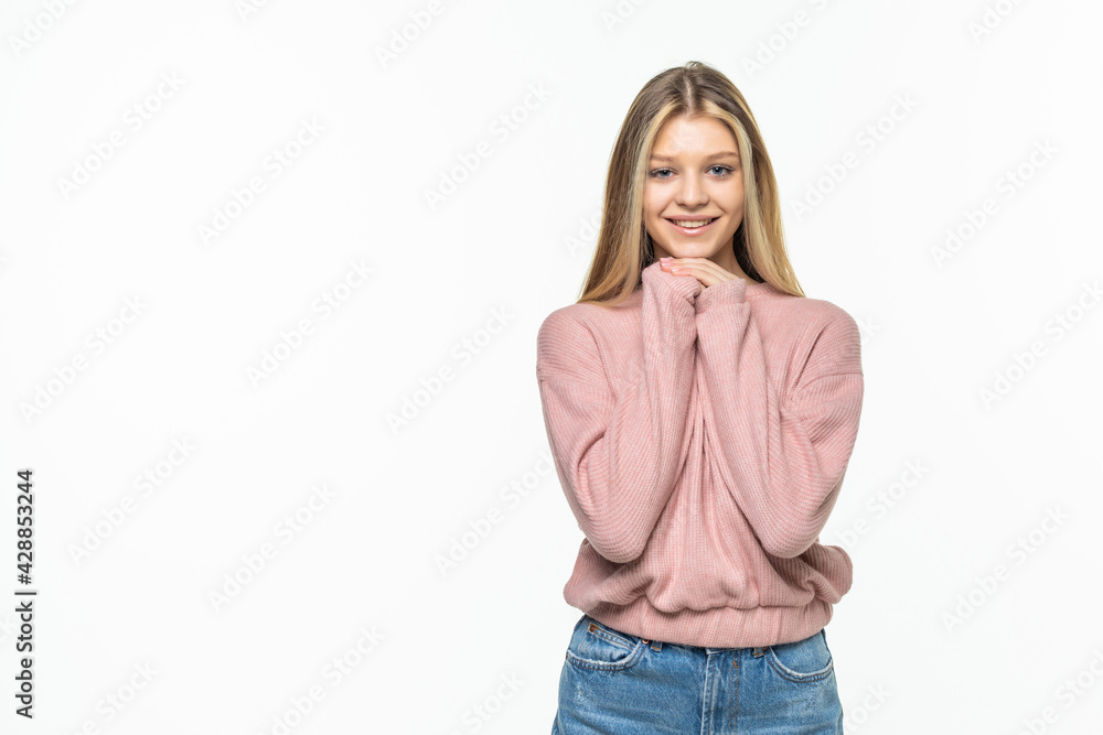 Young charming happy woman standing isolated on gray background Young charming happy woman standing isolated on gray background