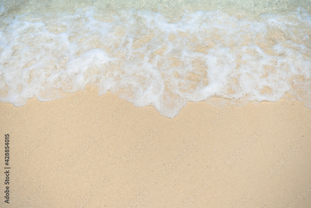 Beautiful clear sand beach and tropical light blue sea. Soft wave of blue ocean on sandy beach. Sallow water, Clear water. Seaside. Beautiful clear sand beach and tropical light blue sea. Soft wave of blue ocean on sandy beach. Sallow water, Clear water. Seaside.