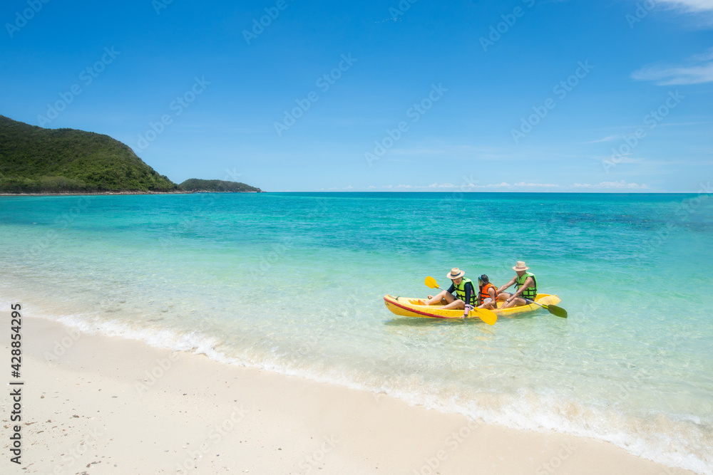 28 Jun 2019 : Chonburi Thailand. Family playing Kayak or canoeing in the sea. Family People traveler kayaking in the ocean. Holiday and outdoor concept. Fresh water. Family time concept. Copy Space. 28 Jun 2019 : Chonburi Thailand. Family playing Kayak or canoeing in the sea. Family People traveler kayaking in the ocean. Holiday and outdoor concept. Fresh water. Family time concept. Copy Space.
