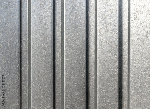 Galvanized corrugated metal close-up as a background.