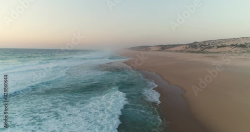sunset aerial on coastline