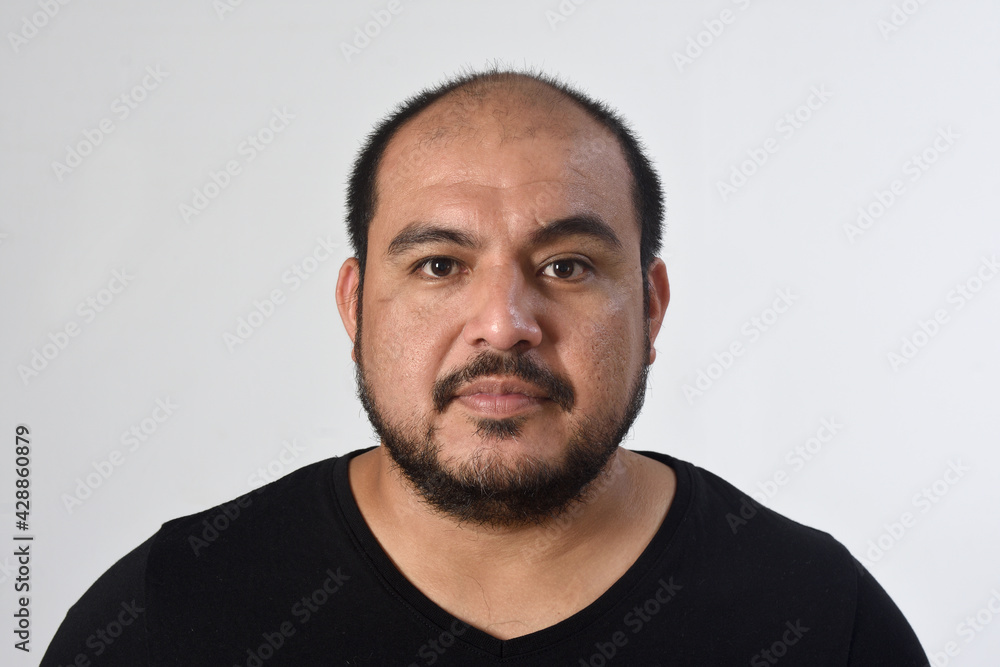 Fototapeta premium portrait of latin american man on white bacgroud