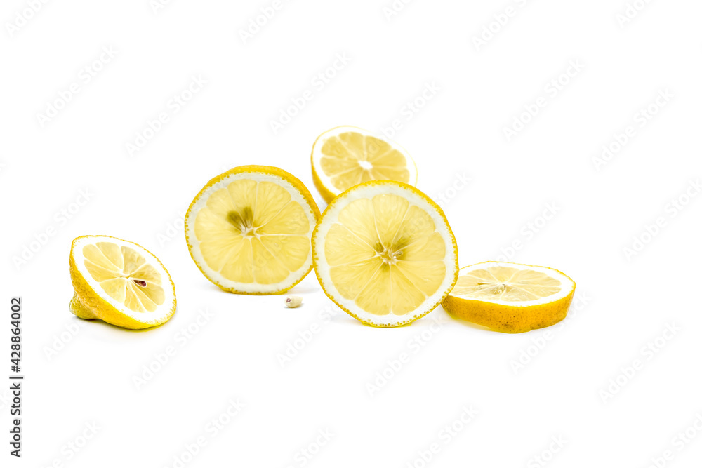 Bright ripe sliced lemon isolated on white background. Bright ripe sliced lemon isolated on white background.