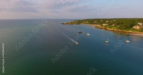 Annisquam Harbor Lighthouse aerial view, Gloucester, Cape Ann, Massachusetts, MA, USA. This historic lighthouse was built in 1898 on the Annisquam River. photo