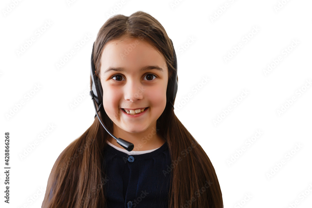 Portrait of child with headset. White background. Portrait of child with headset. White background.