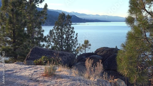 Beautiful establishing shot of Lake Tahoe, California, Nevada, Sierras in winter with snow.