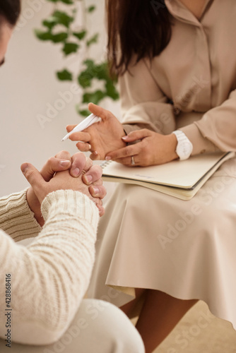 family with a child at a psychotherapist at the reception