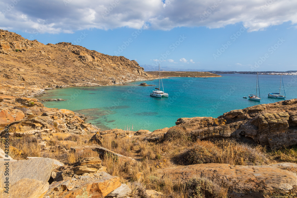 View of the rocky coast at Monasteri Beach. Paros Island, Greece.