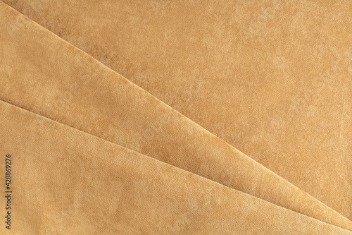 curtain fabric light brown canvas folded diagonally