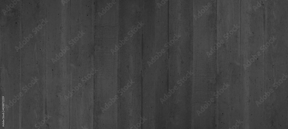 Black anthracite ray grey stone concrete cement wall texture background panorama banner long, with wooden boards structure