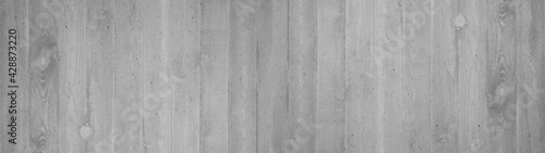 White gray grey stone concrete cement texture background panorama banner long, with wooden boards structure © Corri Seizinger