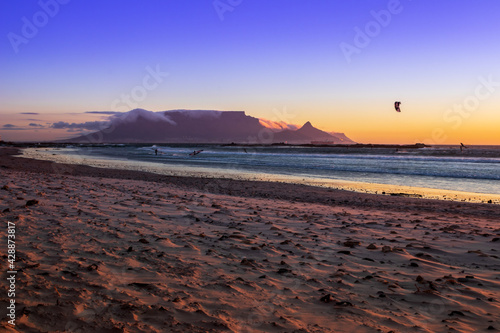 View of Table Mountain and Cape Town city coastline at sunset, Cape Town, South Africa from Blouberg Beach