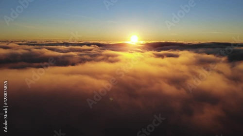 Flying above the clouds real footage, feeling in heaven, 4k relaxing background, flying backwards reversible video