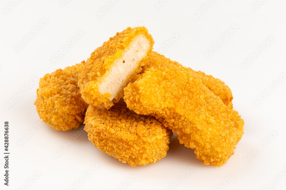 Fried chicken nuggets isolated on the white background. Fried chicken nuggets isolated on the white background.