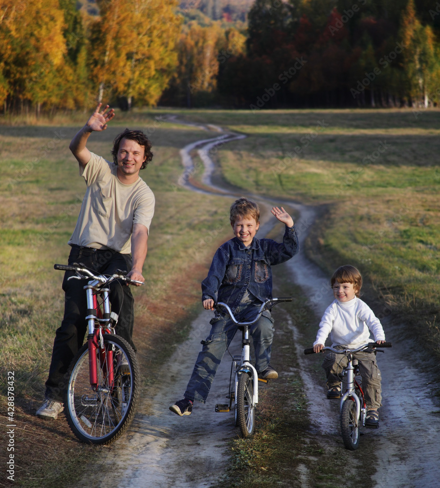 Family On Cycle Ride In Countryside enjoying a bike trip Family On Cycle Ride In Countryside enjoying a bike trip