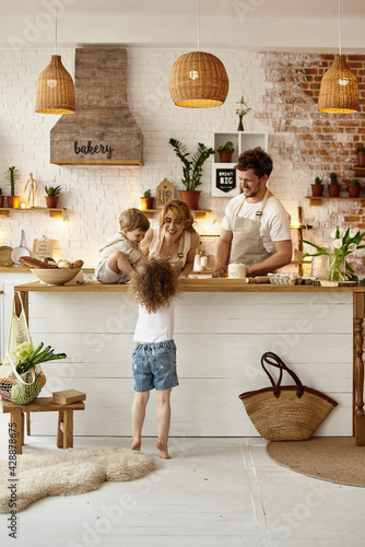 happy family cooking in the kitchen