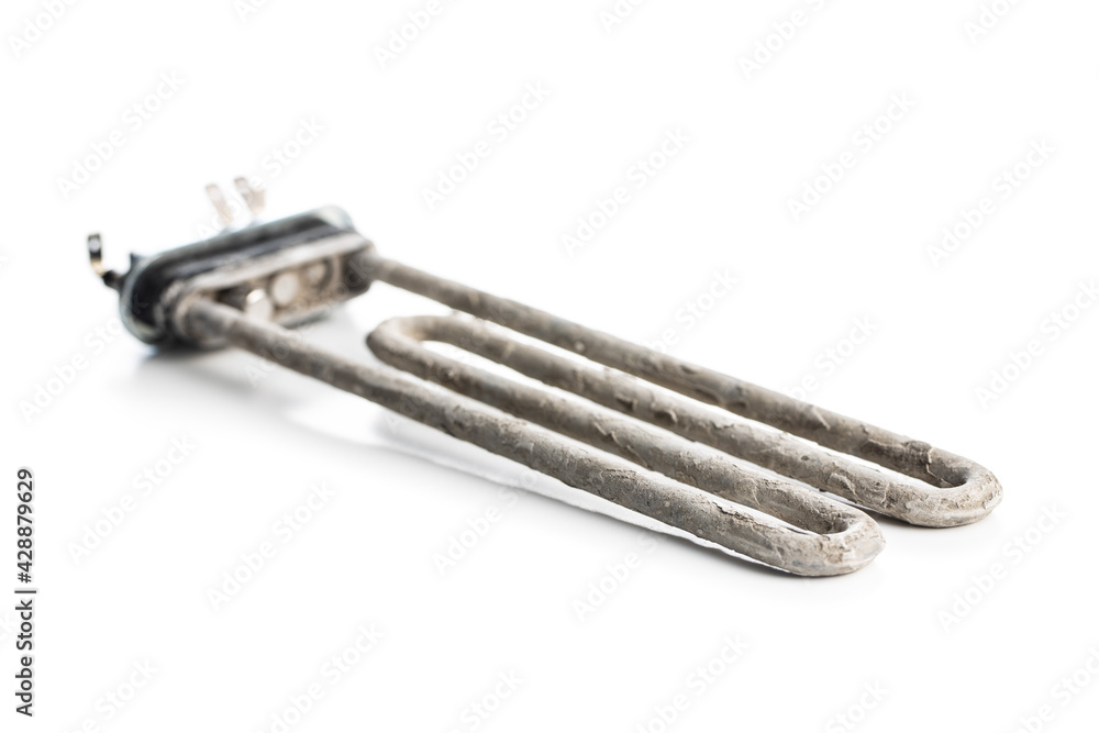 Old washing machine heater with limescale. Old washing machine heater with limescale.