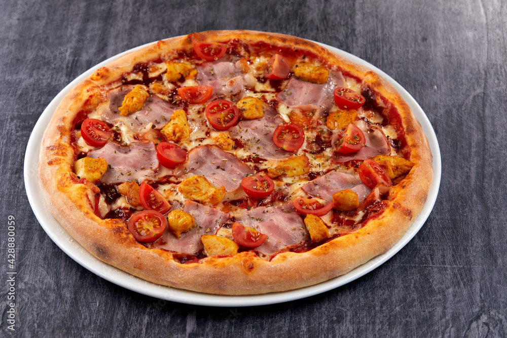 fresh pizza on the white plate fresh pizza on the white plate