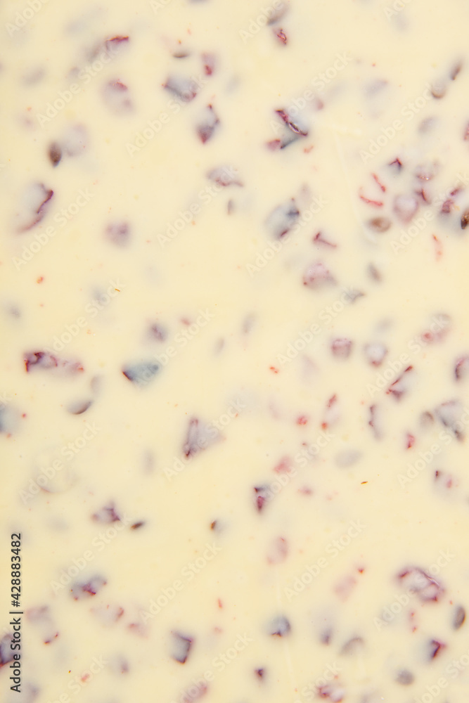 White chocolate with berry texture background White chocolate with berry texture background