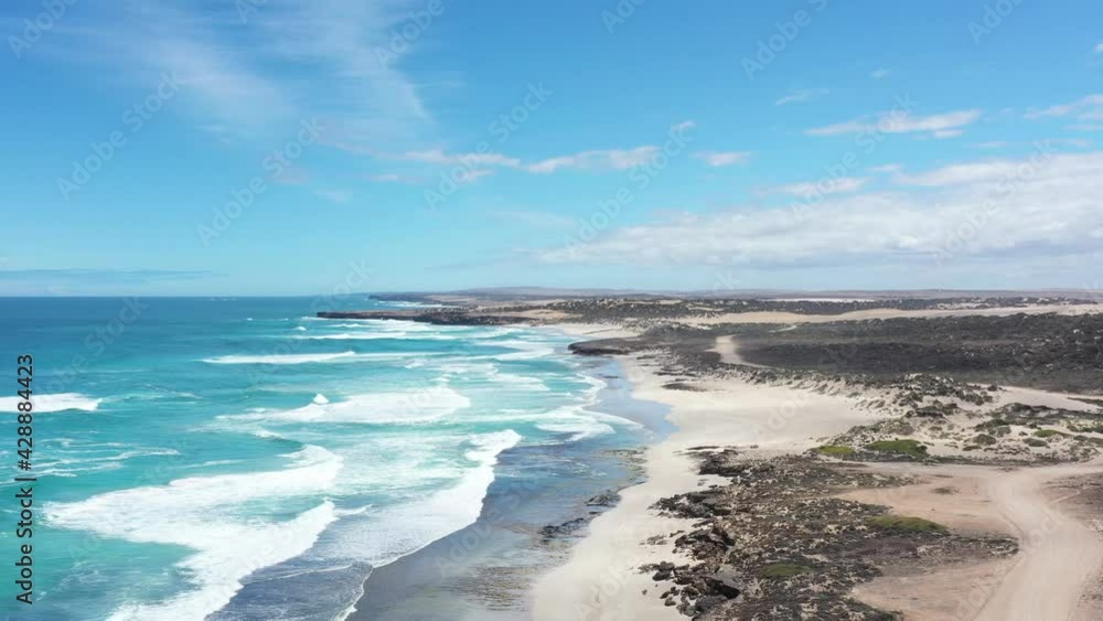 2020 - Excellent aerial shot of waves lapping Sheringa Beach on Eyre Peninsula, South Australia. 2020 - Excellent aerial shot of waves lapping Sheringa Beach on Eyre Peninsula, South Australia.