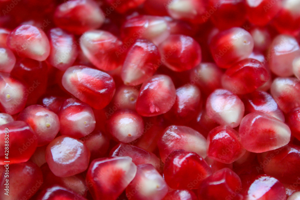 Pomegranate seeds. Macro. Close up. Ripe pomegranate seeds. Pomegranate seeds. Macro. Close up. Ripe pomegranate seeds.